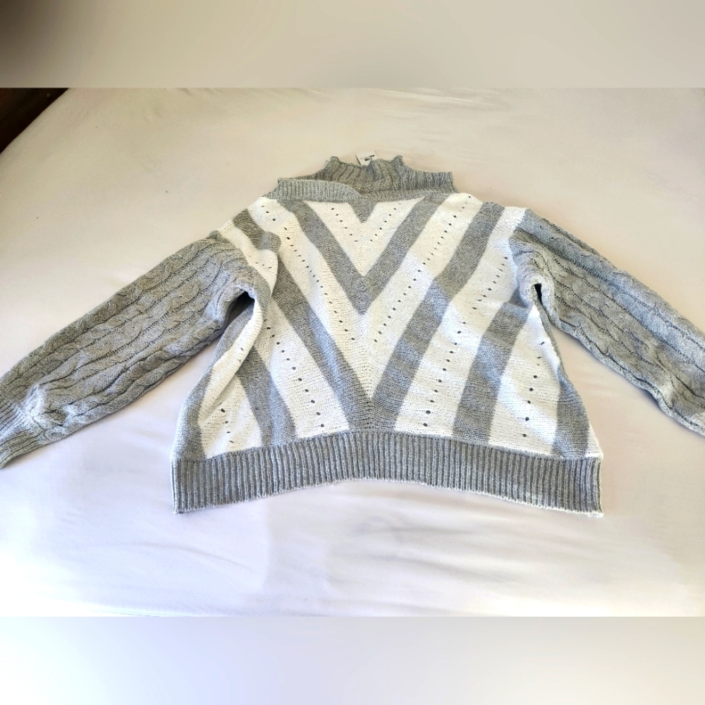 Open shoulder sweater